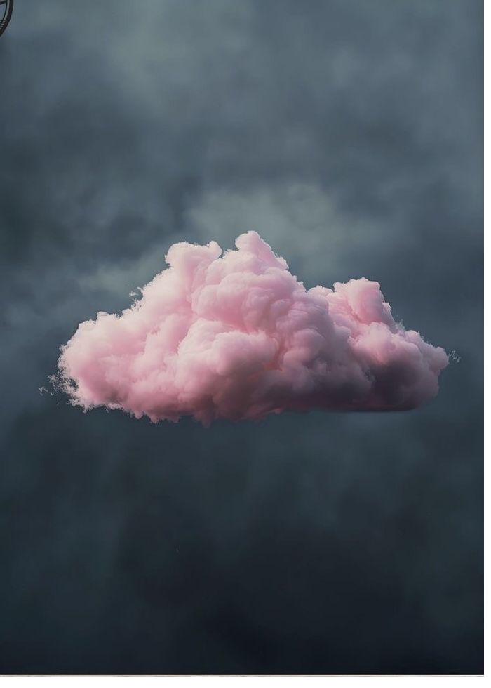 A soft pink cloud suspended in a dark grey sky, representing the inner, imaginative life explored in psychotherapy